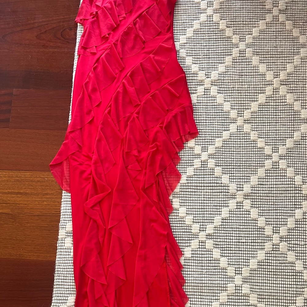 Size small, red strapless dress. Flowy with slit at leg.  Never worn.
